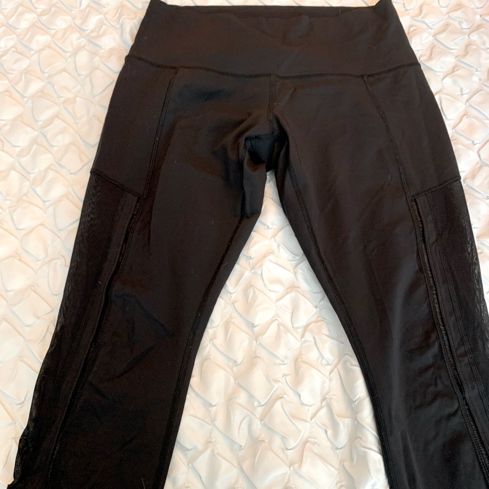 Cropped lululemon black pant with sheer sides